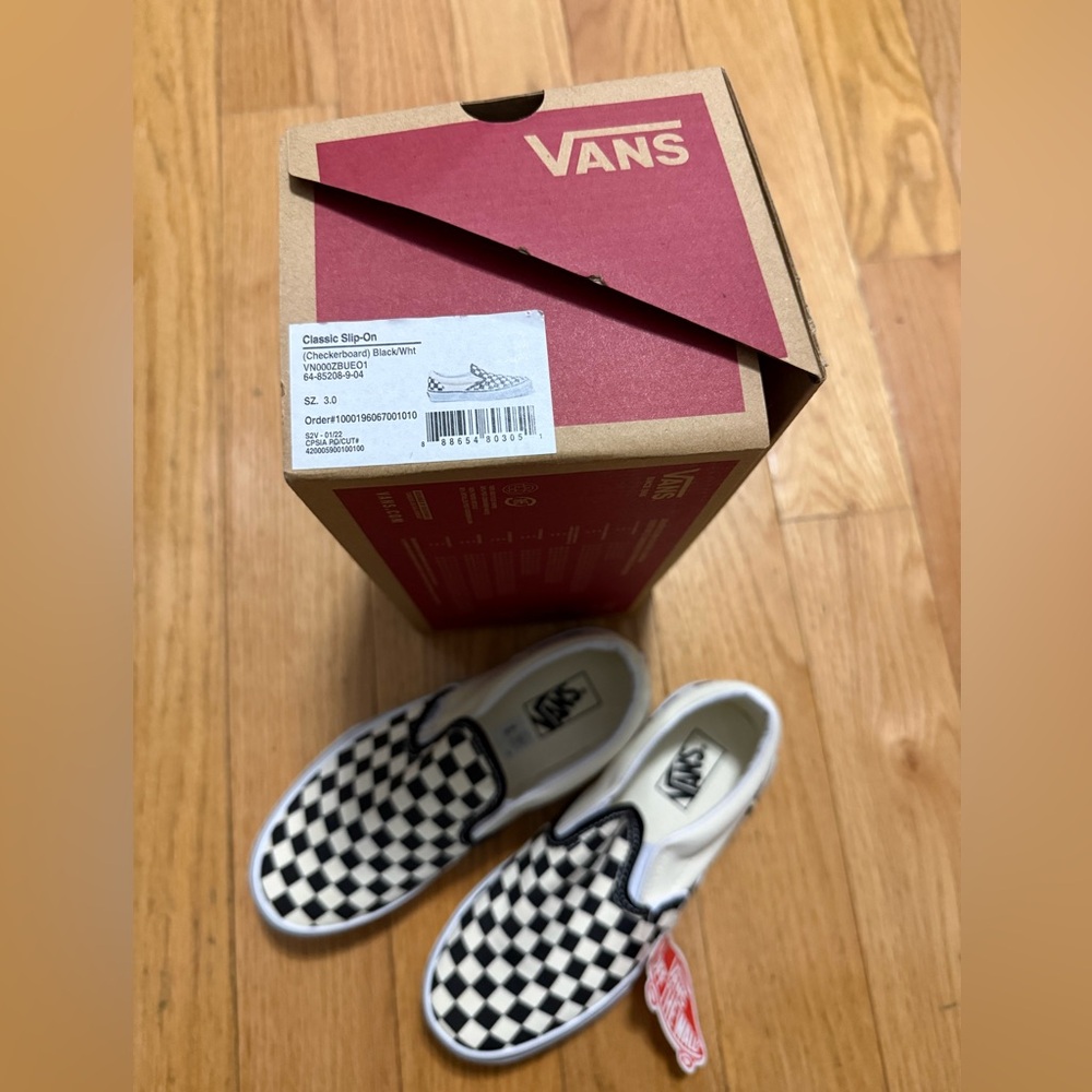 Vans Slip-On Black and White Checkerboard Sneakers